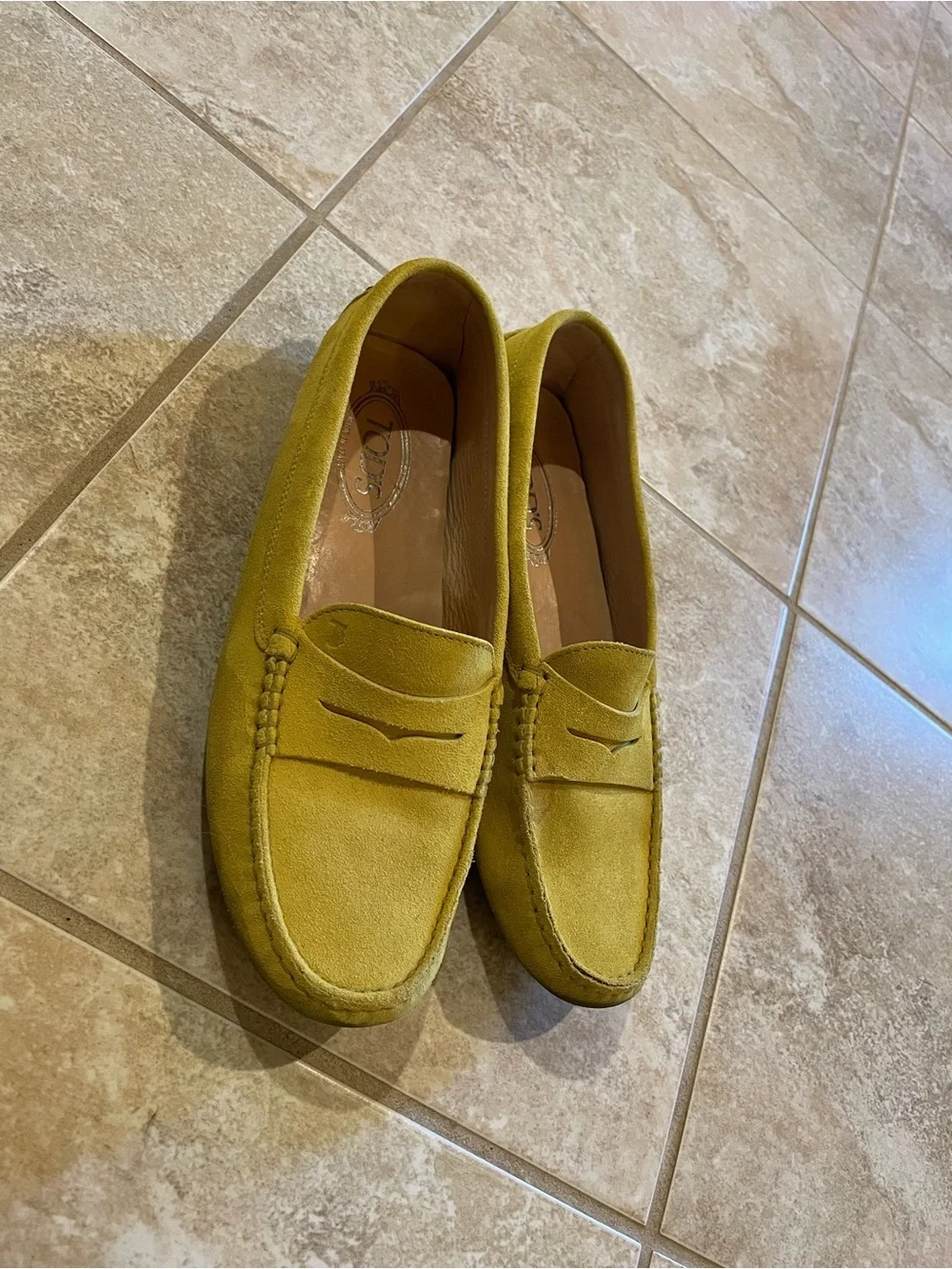 Tod’s Gommino Penny Loafers in Yellow
